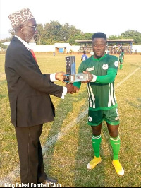 King Faisal's Kwadwo Frimpong receiving his award