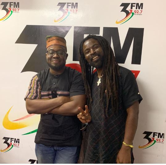 Rocky Dawuni (R)