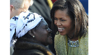 Michelle Obama, wife of US President Barack Obama, greets Obama’s stepmother Kezia Obama