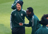 Former Ghana midfielder Michael Essien and Cristiano Ronaldo