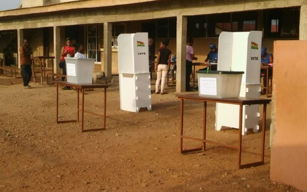 Voters at the polling station