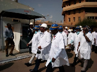 Peter Amewu, Energy Minister touring the facility with some staff of TOR