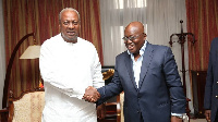 John Mahama (L) shakes Nana Akufo-Addo