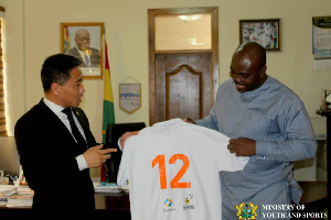 Deputy Manager of Media Division, Mr. Sheng YI with Isaac Asiamah