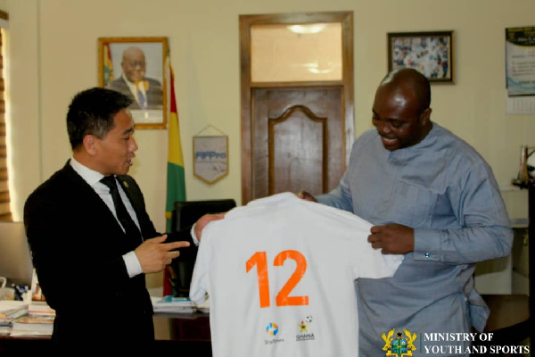 Deputy Manager of Media Division, Mr. Sheng YI with Isaac Asiamah