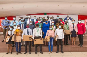 The benefiaries of SONSOL in a photograph with their laptops