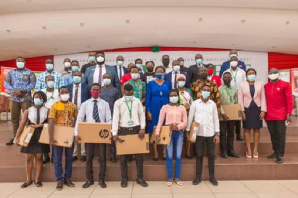 The benefiaries of SONSOL in a photograph with their laptops