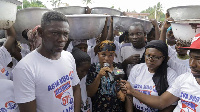 Agya Koo(left), Aligantus in lense (right) campaigning for Nana Addo