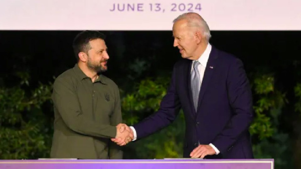 Ukraine's President Volodymyr Zelensky and US President Joe Biden sign bilateral security deal