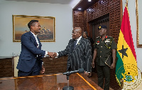 Patrice Evra with President Akufo-Addo