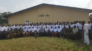 The drone pilots in a group photograph with the minister and their trainers