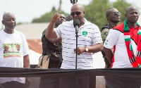 President John Dramani Mahama with others addressing party supporters