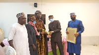 Alhaji Sarki Pro-Umar Tanko Abubakar being presented with the award