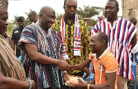 Veep Bawumia interacting with a person with diability