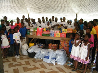 The items include biscuits, mini bags of rice, edible oil, money and many others