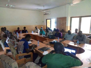 Officials of the NGO at a meeting