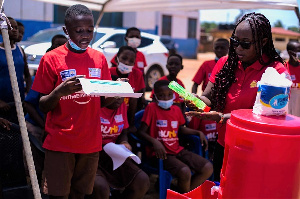 The Corporate Communications Manager of Vivo Energy Ghana, Shirley Tony Kum demonstrating