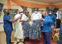 Akufo-Addo in blue taking batakari