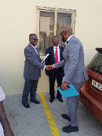 Yaw Ampofo Ankrah exchanging pleasantries with Addo Larbi and and Nana Aborah Boateng