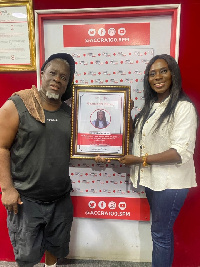 Sasha Marley receiving a citation