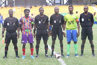 Skippers of both teams with match officials take a group photo