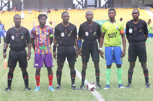 Skippers of both teams with match officials take a group photo