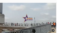 drivers and ‘mates’ captured running to and fro the Pokuase footbridge