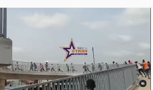 drivers and ‘mates’ captured running to and fro the Pokuase footbridge