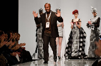 Ghanaian designer Kofi Ansah at the end of one of his shows in 2009