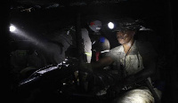 A miner is seen underound at Lonmin Plc's Karee mine in Marikana