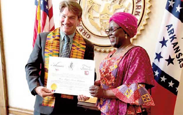 Hajia Alima Mahama receiving the citation from Mark Martin, Arkansas Secretary of State