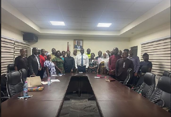 Agriculture Minister, Bryan Acheampong, in a photo with members of PFAG