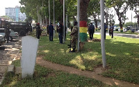 The military officers are preparing for the burial service of Captain Mahama