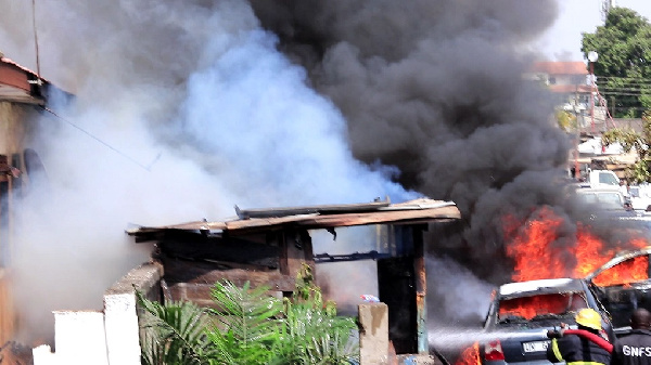 Fire consumes 7 vehicles, part of building at Osu