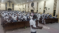 Congregants at the Holy Trinity Catholic Church at Agomanya