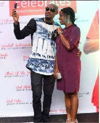 Annie Idibia supports her husband during his latest achievement.