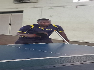 William Asare playing tennis