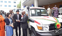 Mochizuiki Hisanobu handing over the keys to the Kwaku Agyeman-Manu (right), Minister of Health