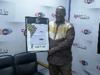 MD (Citi FM and TV) receiving Citi's DO GHANA GOOD plaque