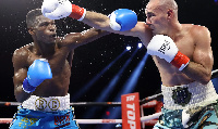 Richard Commey and Jose Pedraza  exchange punches