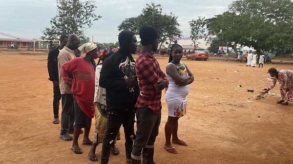 Some of the voters in queue to exercise their franchise