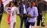 Shafiu being given the golden boot award