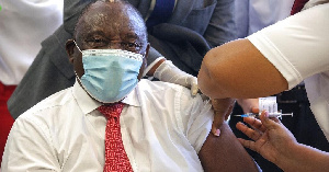 Cyril Ramaphosa, South African President, taking the COVID-19 jab