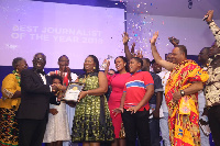 Editor of junior graphic newspaper, Ms Doreen Hammond receiving her award