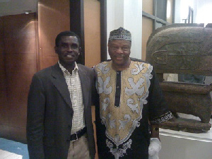 Francis Kwarteng, left, Dr. Molefi Kete Asante, right