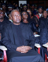 Former President John Mahama in a solemn state during the burial service of Late Amissah-Arthur