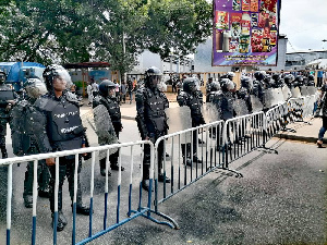 Armed police at post