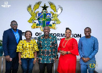 Delegates from Ghana Chamber of Young Entrepreneurs and the minister for information in a photo