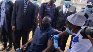 President Julius Maada Bio gets a Covid-19 jab as Sierra Leone rolls out its Covid-19 vaccination