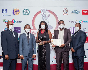 Emirates team in Ghana accepts the award at the Ghana Business Standard Awards